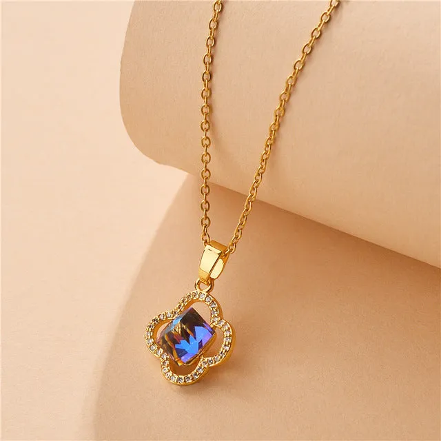 Blue Crystal Four Leaf Flower Gold Colour Pendant