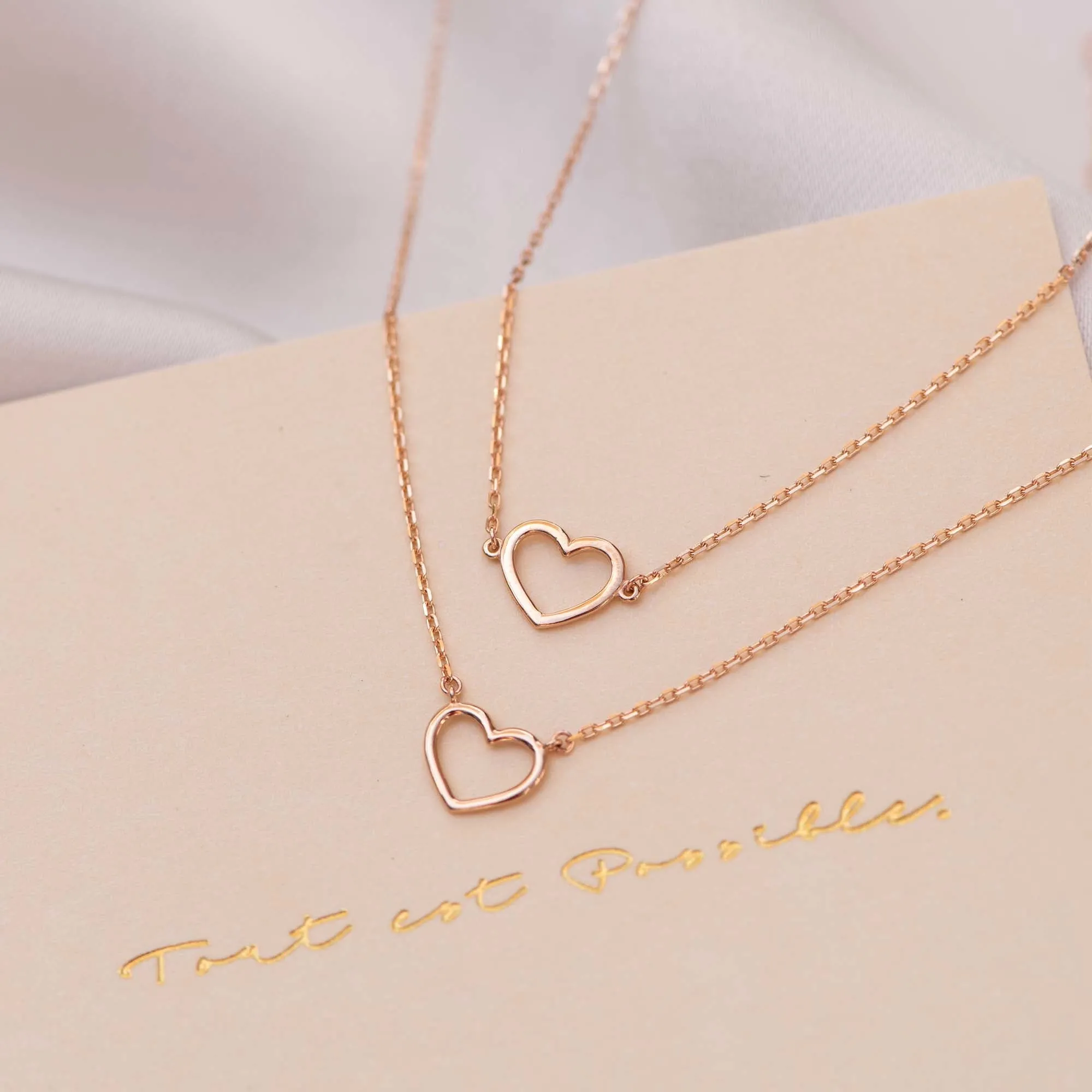 La Concorde Amore 14 karat rose gold necklace with heart